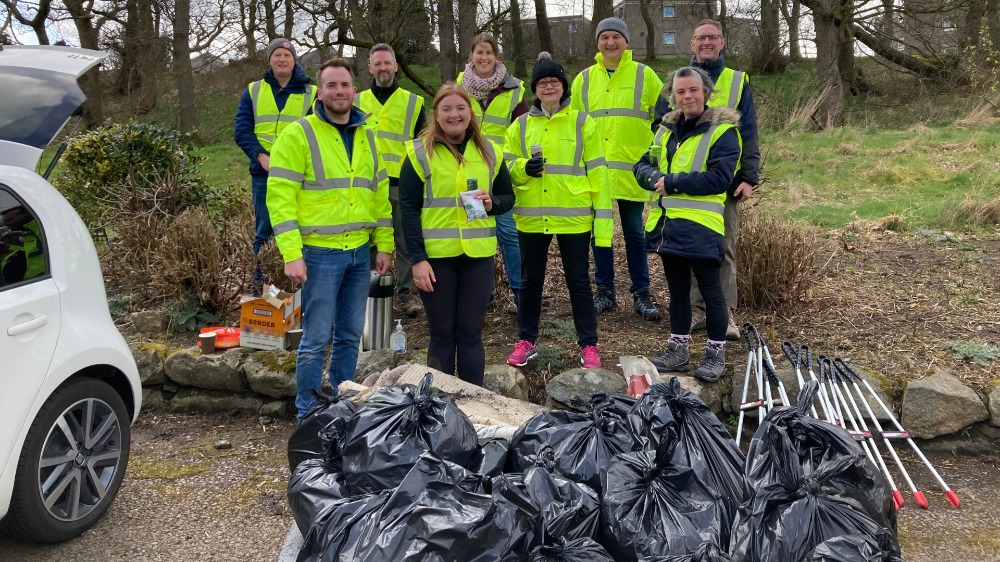 The crew with the haul of filled bags. Image supplied