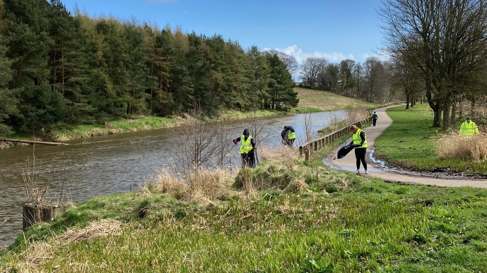 The crew hard at work with the Don as a backdrop. Image supplied.